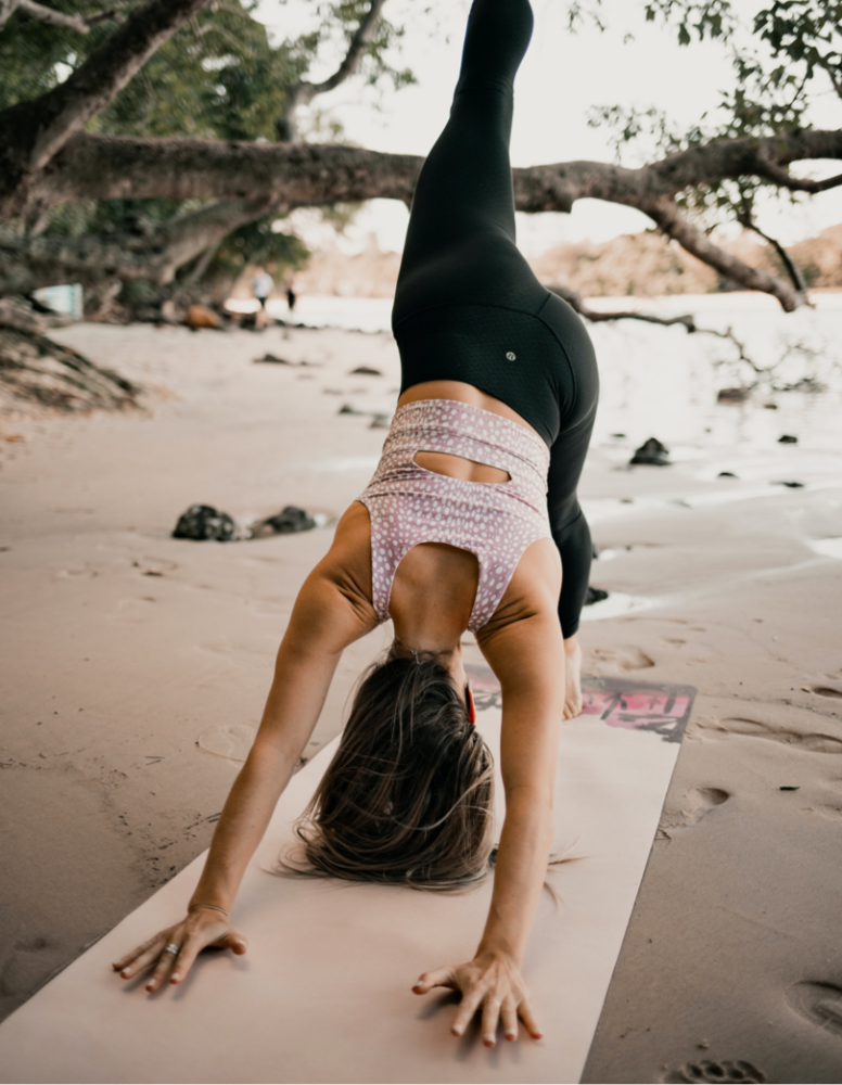 Allie Van Fossen practicing yoga outdoors